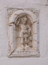 Stone carving in wall in Monte Sant`Angelo, on the Gargano Promontory in Puglia, southern Italy.