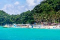 Puka beach with Hopping tour boats view from water in Boracay Royalty Free Stock Photo
