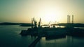 PULA, CROATIA - AUGUST 5, 2017. Aerial view of the shipyard silhouette at sunset