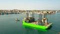 PULA, CROATIA - AUGUST 4, 2017. Aerial view of unfinished jack-up rig vessel Apollo being towed in the harbour