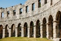 Pula, Croatia - June 1, 2019: Walls of the ruins of the Pula Coliseum