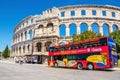 Red city tour and ancient roman amphitheatre in Pula city in Croatia