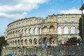 PULA, CROATIA, SEPTEMBER 24, 2017: Tourists visit the famous Arena in Pula ,The Arena is the only remaining Roman amphitheater to