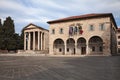 Pula, Istria, Croatia: the ancient Roman Temple of Augustus and the town hall Royalty Free Stock Photo