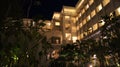 PULAU LANGKAWI, MALAYSIA - APR 4th 2015: THE DANNA luxury Hotel at night on Langkawi island with view of palm tree. Royalty Free Stock Photo