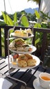 PULAU LANGKAWI, MALAYSIA - APR 5th 2015: English tea time with Homemade vanilla muffins on metal etagere in a luxury