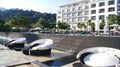 PULAU LANGKAWI, MALAYSIA - APR 4th 2015: Lounge chairs at swimming pool of THE DANNA luxury Hotel on Langkawi island Royalty Free Stock Photo