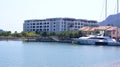 PULAU LANGKAWI, MALAYSIA - APR 4th 2015: View of THE DANNA luxury Hotel on Langkawi island with the harbour and a ship Royalty Free Stock Photo