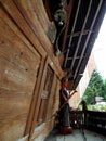 Reproduction of a sentry at the prison gate at Huta Siallagan Ancient Batak Village on Lake Toba, Pulau Samosir. Indonesia