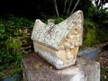 Tomb stone at Huta Siallagan Ancient Batak Village on Lake Toba, Pulau Samosir. Indonesia