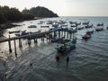 Aerial view fishing jetty with boats parking.