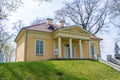 Yellow Alexandria Cottage in park of Czartoryski Palace in Pulawy, Poland.