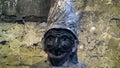 Pulcinella statue in an alley in Naples, Italy