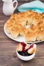 Pull apart monkey bread with black currant jam in a plate Royalty Free Stock Photo