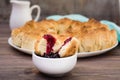 Pull apart monkey bread with black currant jam in a plate Royalty Free Stock Photo