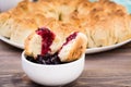 Pull apart monkey bread with black currant jam in a plate Royalty Free Stock Photo