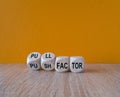 Pull or push factor symbol. Concept word Pull factor and Push factor on wooden cubes. Beautiful wooden table orange background. Royalty Free Stock Photo