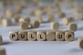 Pull up - cube with letters, sign with wooden cubes