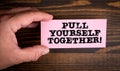 Pull yourself together. Note in a man& x27;s hand Royalty Free Stock Photo