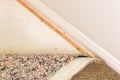 Pulled Back Carpet and Padding In Room Royalty Free Stock Photo
