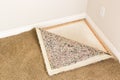 Pulled Back Carpet and Padding In Room Royalty Free Stock Photo