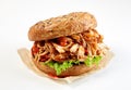 Pulled chicken kebab burger on a wholegrain bun