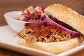 Pulled Pork BBQ Sandwich with Apple Cole Slaw Royalty Free Stock Photo