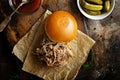 Pulled pork sandwich on a brioche bun Royalty Free Stock Photo