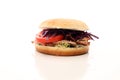 Pulled pork sandwiches with BBQ sauce, cabbage and tomato on tab Royalty Free Stock Photo