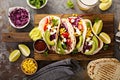 Pulled pork tacos with red cabbage and avocados