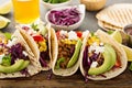 Pulled pork tacos with red cabbage and avocados Royalty Free Stock Photo