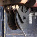 pulley from heavy machinery - Machine to hammer the piles in the construction road junction in Moscow. Royalty Free Stock Photo