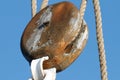 Deflection pulley of a sailing ship with ropes Royalty Free Stock Photo