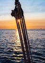 Pulley silhouette on a sailboat at sunset Royalty Free Stock Photo