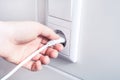 Pulling An Electrical Plug Out Of A Wall Socket, Energy Saving Concept Royalty Free Stock Photo