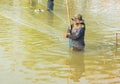 Pulling fish net in thailand. Royalty Free Stock Photo