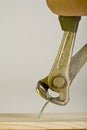 Pulling out nail with pincers Royalty Free Stock Photo