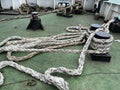 Pulling ship ropes to anchor the ship so that it is not carried away by the waves Royalty Free Stock Photo