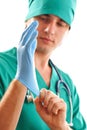 Pulling on surgical glove Royalty Free Stock Photo