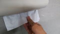 Pulling toilet paper