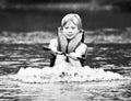 Pulling a Water Skier / Boy Royalty Free Stock Photo