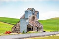 Delapidated old grain silo along a road in the Palouse Hills