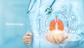 Pulmonology medicine concept. Respiratory system examination and treatment. Doctor holding in hand the hologram of Lungs and