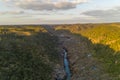 Pulo do Lobo waterfall drone aerial view with river guadiana and beautiful green valley landscape at sunset in Mertola Alentejo,