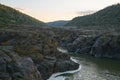 Pulo do Lobo waterfall with river guadiana and rock details at sunset in Mertola Alentejo, Portugal Royalty Free Stock Photo