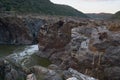 Pulo do Lobo waterfall with river guadiana and rock details at sunset in Mertola Alentejo, Portugal Royalty Free Stock Photo