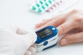 Pulse Oximeter finger digital device to measure oxygen saturation in blood Royalty Free Stock Photo