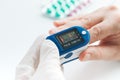 Pulse Oximeter finger digital device to measure oxygen saturation in blood Royalty Free Stock Photo