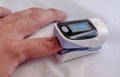 Pulse oximeter on the patient's hand Royalty Free Stock Photo
