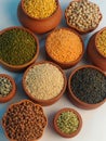 Pulses and cereals in earthen bowls